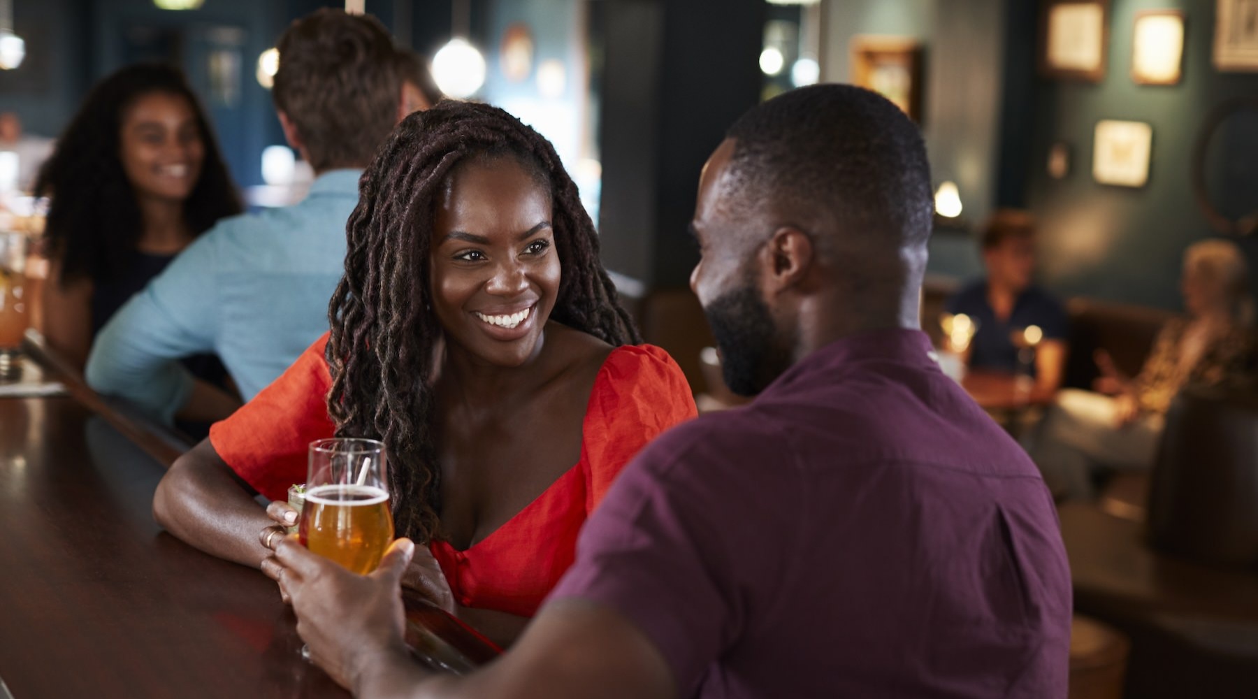 Couple at a local bar having drinks 